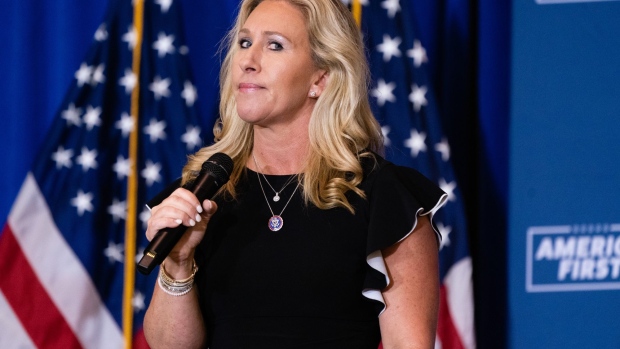 Representative Marjorie Taylor Greene, a Republican from Georgia, gestures while speaking during an America First rally in Dalton, Georgia, U.S., on Thursday, May 27, 2021. The event is one in a series she is co-hosting with Representative Matt Gaetz, a Republican from Florida, across the country.