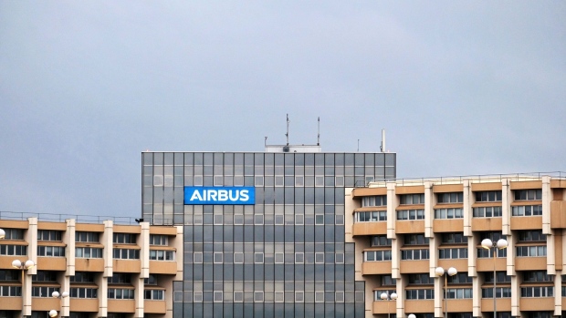 An Airbus SE logo sits on the company's M01 office building in Toulouse, France, on Tuesday, June 9, 2020. The French government unveiled a rescue plan for the struggling aerospace industry that includes billions of euros to support Airbus and its suppliers hard hit by the Covid-19 pandemic.