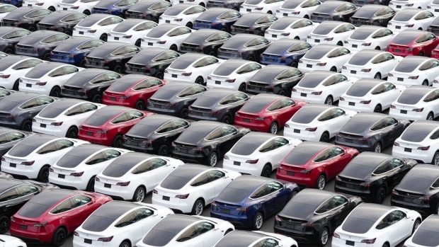 Tesla Inc. vehicles in a parking lot after arriving at a port in Yokohama, Japan, on Thursday, Oct. 28, 2022. Tesla, which was briefly a part of the trillion-dollar valuation group, currently has a market capitalization of about $650 billion. Photographer: Toru Hanai/Bloomberg