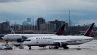 Air Canada airplanes on tarmac with Toronto skyline