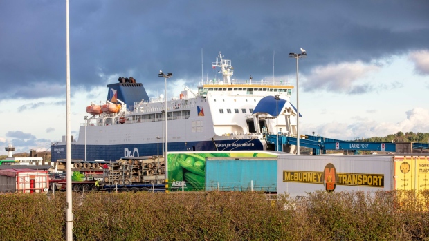 Haulage trucks near the European Highlander ferry, operated by P&O Ferries Ltd, at Larne Port in Larne, Northern Ireland, U.K., on Monday, Dec. 7, 2020. U.K. Prime Minister Boris Johnson warned a time may be coming to recognize that Brexit negotiations have failed, as he prepares to travel to Brussels for crisis talks on a future trade deal. Photographer: Paul Faith/Bloomberg
