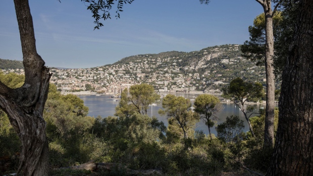 The town of Villefrance-sur-Mer sits on the coast beyond the private gardens of the Villa Les Cedres, a 187-year-old, 18,000-square-foot, 14-bedroom mansion set on 35 acres, in Saint-Jean-Cap-Ferrat, France, on Tuesday, Sept. 26, 2017. With a list price of €350 million ($410 million), the owner, the Italian distiller Davide Campari-Milano SpA, is betting that the house’s combination of history, luxury, and a prime location along the coast of Saint-Jean-Cap-Ferrat will be enough to make it the most expensive residential sale in history.