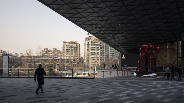 An employee walks through the campus of the Ant Group Co. headquarters in Hangzhou, China, on Wednesday, Jan. 20, 2021. Ant Co-Founder Jack Ma resurfaced for the first time since China’s government began clamping down on his business empire nearly three months ago, appearing in a live-streamed video that sent Ant affiliate Alibaba Group Holding Ltd.'s stock soaring but left plenty of unanswered questions about the billionaire’s fate. Photographer: Qilai Shen/Bloomberg