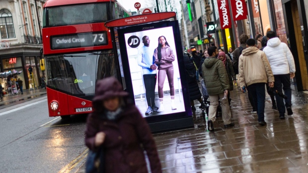 An advertisement for JD Sports Fashion Plc at a bus stop on Oxford Street in London, UK, on Tuesday, Jan. 10, 2023. JD Sports is due to give a trading update on Wednesday. Photographer: Carlos Jasso/Bloomberg