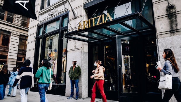 A shopper exits an Aritzia store in New York. The chain is taking US market share with high-touch service and few discounts.