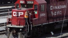 Canadian Pacific Railway locomotive with worker