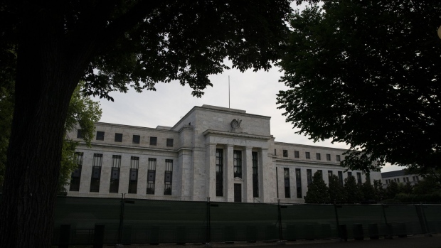 The Marriner S. Eccles Federal Reserve building in Washington, D.C., US, on Wednesday, July 6, 2022. The Federal Reserve will unveil details of what policy makers debated last month that may shed light on how they view the near-term path for interest rates amid surging inflation and signs of a slowing economy.