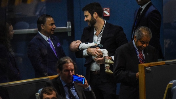 Ardern's partner Clarke Gayford holds their baby Neve during the United Nations General Assembly in September 2018. Photographer: Stephanie Keith/Getty Images
