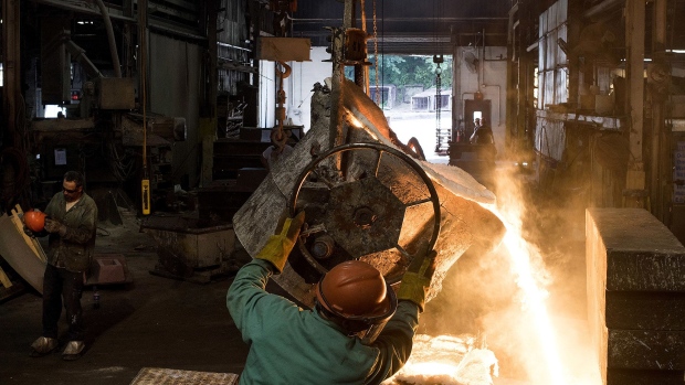 Molten steel is poured into a large mold at a castings facility in Salem, Ohio. Photographer: Ty Wright/Bloomberg