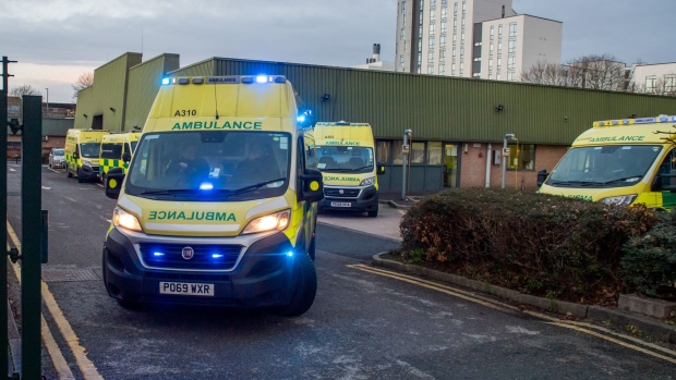 An ambulance departs from Central Ambulance Station during strike action by ambulance workers in Manchester, UK, on Wednesday, Jan. 11, 2023. Members of two unions, Unison and the GMB, are walking out as part of an ongoing row over real-terms pay cuts suffered by staff in the National Health Service.
