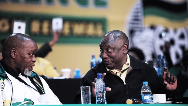 Gwede Mantashe, South Africa's mineral resources and energy minister, left, and Cyril Ramaphosa, South Africa's president, on day three of the 55th national conference of the African National Congress party in Johannesburg, South Africa, on Sunday, Dec. 18, 2022. Former Health Minister Zweli Mkhize will compete with Cyril Ramaphosa to lead the African National Congress at a five-yearly elective conference that begins Friday.
