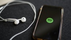 The logo for Spotify on a smartphone. Photographer: Gabby Jones/Bloomberg