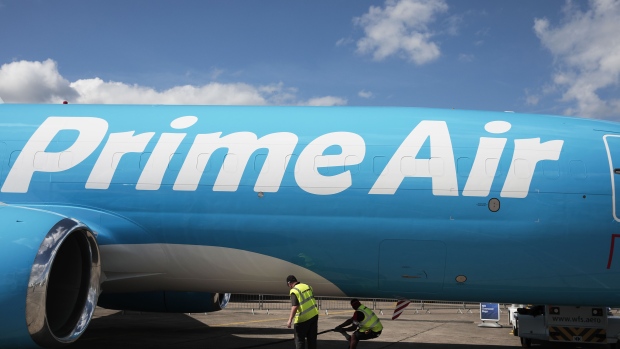A Boeing Co. 737 Prime Air cargo plane, operated by Amazon.com Inc., sits on on display ahead of the 53rd International Paris Air Show at Le Bourget in Paris, France, on Sunday, June 16, 2019. The show is the world's largest aviation and space industry exhibition and runs from June 17-23. Photographer: Jason Alden/Bloomberg