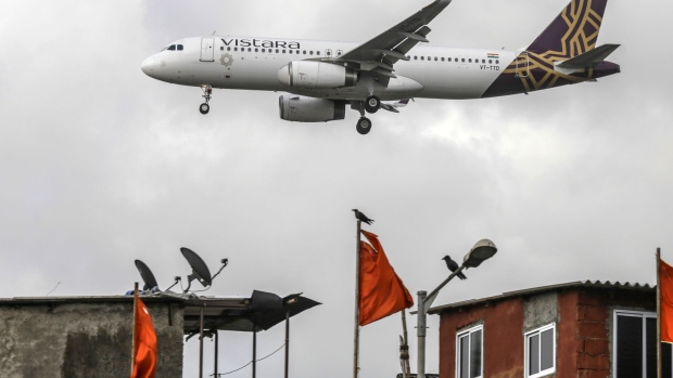 A Vistara aircraft prepares to land at Chhatrapati Shivaji International Airport in Mumbai, India, on Monday, July 10, 2017. India, which was the world’s fastest growing aviation market last year, is crucial for planemakers like Boeing Co. and Airbus SE, as airlines see increased demand from the rising middle class.