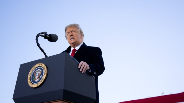 U.S. President Donald Trump speaks during a farewell ceremony at Joint Base Andrews, Maryland, U.S., on Wednesday, Jan. 20, 2021. Trump departs Washington with Americans more politically divided and more likely to be out of work than when he arrived, while awaiting trial for his second impeachment - an ignominious end to one of the most turbulent presidencies in American history. Photographer: Stefani Reynolds/Bloomberg