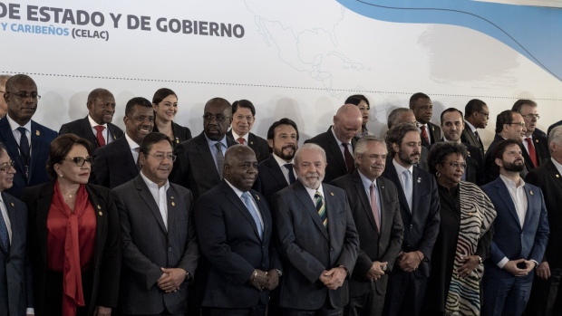 Argentina’s Alberto Fernandez, center right, and Brazil’s Luiz Inacio Lula da Silva, center left, during a group photograph at the Celac Summit in Buenos Aires on Jan. 24.