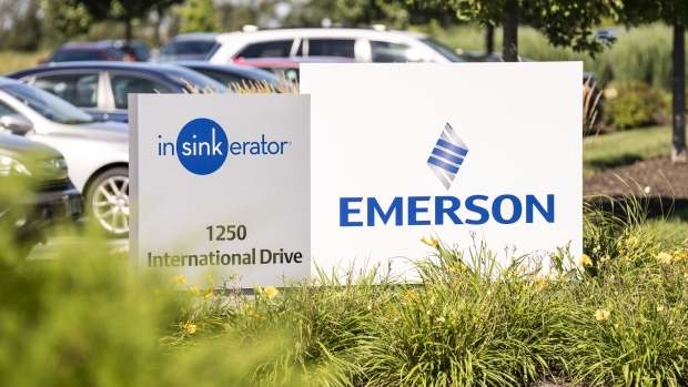 Emerson Electric Co. and Insinkerator signage outside the company's headquarters in Mount Pleasant, Wisconsin, US, on Tuesday, Aug. 9, 2022. Whirlpool Corp. agreed to buy Insinkerator, Emerson Electric Co.'s garbage-disposal business, in a $3 billion transaction. Photographer: Sara Stathas/Bloomberg