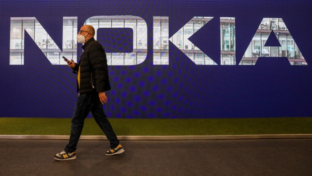 A logo at the Nokia Oyj stand on the opening day of the MWC Barcelona at the Fira de Barcelona venue in Barcelona, Spain, on Monday, Feb. 28, 2022. Over 1,800 exhibitors and attendees from 183 countries will attend the annual event, which runs from Feb. 28 to March 3. Photographer: Angel Garcia/Bloomberg