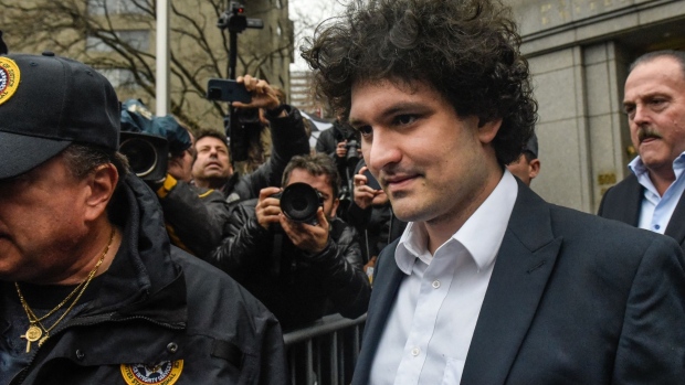 Sam Bankman-Fried, co-founder of FTX Cryptocurrency Derivatives Exchange, departs from court in New York, US, on Tuesday, Jan. 3, 2023. Bankman-Fried pleaded not guilty to criminal charges Tuesday and is set to face a trial in October, a courtroom showdown likely to be one of the highest-profile white-collar fraud cases in recent years. Photographer: Stephanie Keith/Bloomberg