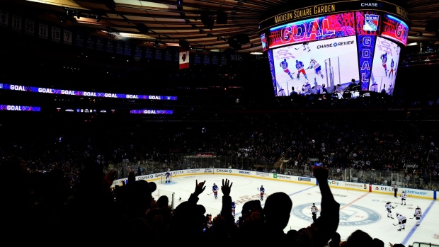 NEW YORK, NEW YORK - OCTOBER 12: Fans celebrate a first-period goal by Kaapo Kakko #24 of the New York Rangers, the first of his NHL career, during a game against the Edmonton Oilers at Madison Square Garden on October 12, 2019 in New York City. (Photo by Emilee Chinn/Getty Images)