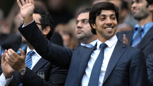 Billionaire Sheikh Mansour bin Zayed Al Nahyan, owner of Manchester City soccer club, looks on during the English Premier League football match against Liverpool at The City of Manchester stadium, Manchester on Aug. 23, 2010.