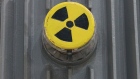 LUBMIN, GERMANY - JUNE 08: A symbol for radioactivity is visible on a radioactively-contaminated container once used to transport nuclear fuel rods at the nearby Greifswald former nuclear power plant at the Zwischenlager Nord temporary nuclear waste storage facility on June 8, 2011 in Lubmin, Germany. The Zwischenlager Nord, run by Energiewerke Nord GmbH, contains low, medium and high radioactive waste as well as spent nuclear fuel rods from both west and east German nuclear power plants and research reactors. The German government has stepped up its efforts to create a permanent nuclear storage site, and the former mines at Schacht Konrad and Gorleben are under consideration, though both remain controversial. The government recently announced it will phase out nuclear energy in Germany completely by 2022. (Photo by Sean Gallup/Getty Images) Photographer: Sean Gallup/Getty Images Europe
