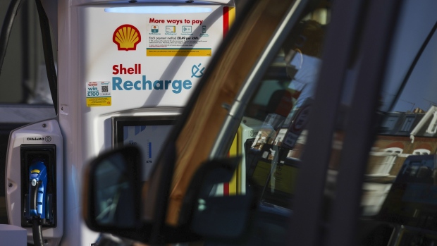 A recharging point at a Shell Recharge electric vehicle charging hub, operated by Royal Dutch Shell Plc, after re-opening to the public following a replacement of petrol and diesel pumps, in London, U.K., on Thursday, Jan. 13, 2022. The U.K. has banned the sale of new petrol and diesel cars from 2030, which will require a swift build out of the charging network.