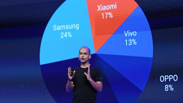 Manu Jain, vice president of Xiaomi Corp., speaks during the launch of the Mi A1 dual camera device in New Delhi, India, on Tuesday, Sept. 5, 2017. Google is teaming with China's Xiaomi to resurrect its Android One smartphone program for India, revamping a stalled effort to showcase its mobile software for users in emerging markets.