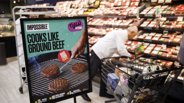 Impossible Foods signage at a grocery store in Los Angeles. Photographer: Patrick T. Fallon/Bloomberg