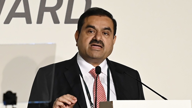 Gautam Adani, chairman of Adani Group, speaks during the Forbes CEO Summit in Singapore, on Tuesday, Sept. 27, 2022. India needs fossil fuels to serve large populations and getting rid of all fossil fuels instantly would not work for the nation, Adani said.