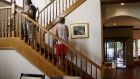 Potential home buyers take a tour during an open house in Manhattan Beach, California. Photographer: Patrick T. Fallon/Bloomberg
