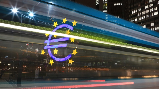 FRANKFURT AM MAIN, GERMANY - JANUARY 08: A tram passes the giant Euro symbol outside the headquarters of the European Central Bank (ECB) on January 8, 2013 in Frankfurt am Main, Germany. The governing board of the ECB is scheduled to meet this coming Thursday and analysts are predicting the bank will keep its interest rates steady. (Photo by Hannelore Foerster/Getty Images)