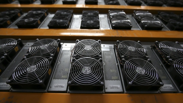Bitmain mining machines at a Canada Computational Unlimited Inc. computation center in Joliette, Quebec, Canada, on Friday, Sept. 10, 2021. CCU.ai, a Bitcoin mining center powered by hydroelectricity, has been conditionally approved for trading on the TSX Venture Exchange in Toronto under the stock symbol SATO. Photographer: Christinne Muschi/Bloomberg