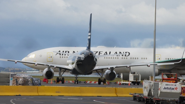 Air New Zealand Ltd. aircraft on the tarmac at Auckland International Airport in Auckland, New Zealand, on Monday, April 19, 2021. Australia and New Zealand on Monday started their first quarantine-free flights since the pandemic began, after they successfully halted Covid-19 transmissions from spreading through their nations. Photographer: Brendon O'Hagan/Bloomberg
