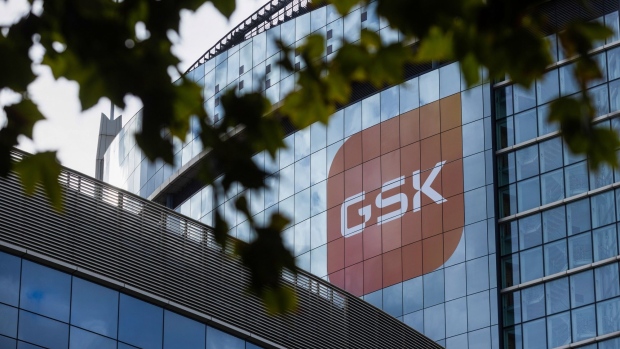 The GSK Plc logo on the exterior of the headquarters of the company in the Brentford district of London, UK, on Monday, Oct. 31, 2022. GSK is due to report its latest earnings figures on Nov. 2. Photographer: Chris Ratcliffe/Bloomberg