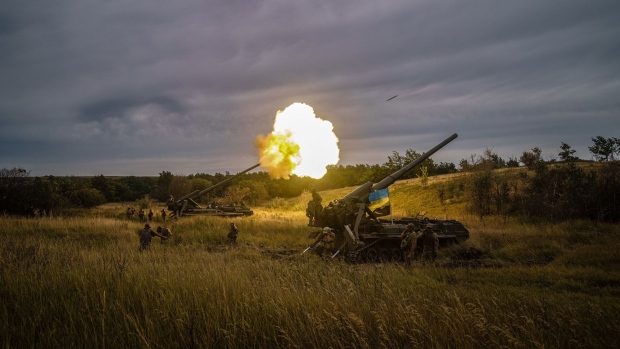 Ukrainian artillery unit fires at a position near a frontline in Kharkiv region. Photographer: Ihor Thachev/AFP/Getty Images