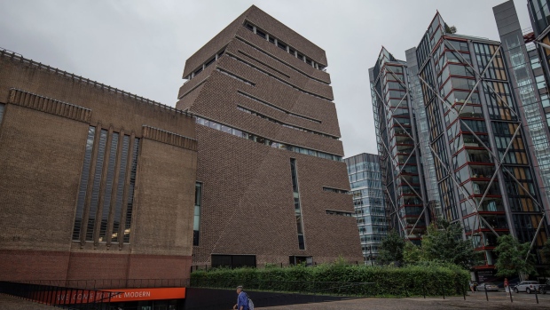 LONDON, ENGLAND - AUGUST 05: A member of the public walks past the Tate Modern on August 05, 2019 in London, England. A six-year-old boy was in critical but stable condition after falling from a 10th floor viewing platform onto a 5th floor roof at the museum on Sunday. A 17-year-old boy was arrested on suspicion of attempted murder for allegedly throwing or pushing him over a railing. (Photo by Dan Kitwood/Getty Images)