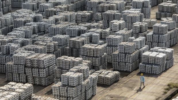 Piles of aluminum ingots at a stockyard in Wuxi, Jiangsu province, China, on Thursday, Sept. 30, 2021. China's energy crunch spans at least 20 provinces and has had a mixed impact on the base metals market, as supply disruptions have helped underpin a rally in aluminum. Photographer: Qilai Shen/Bloomberg