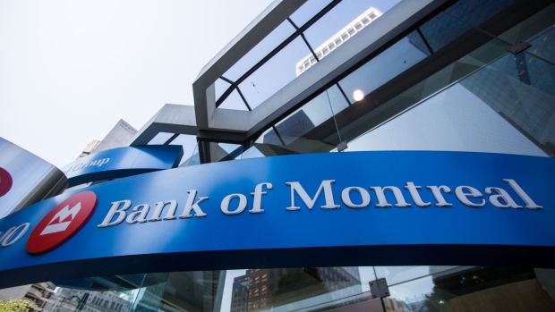 Bank of Montreal signage is displayed outside a branch in Vancouver, British Columbia, Canada, on Friday, Aug. 25 2017. The Bank of Montreal is scheduled to release earnings figures on August 29. Photographer: Ben Nelms/Bloomberg