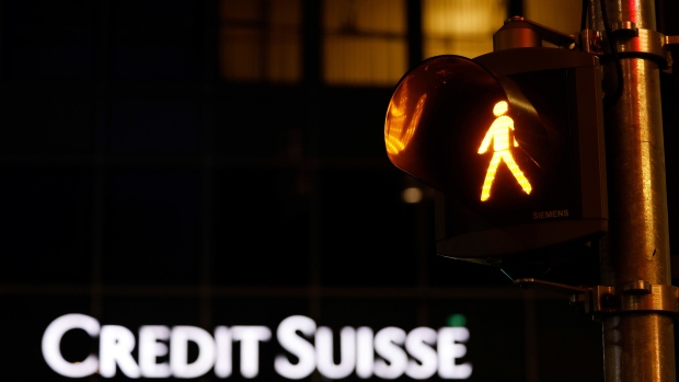 A pedestrian crossing light outside a Credit Suisse Group AG bank branch in Basel, Switzerland, on Tuesday, Oct. 25, 2022. Credit Suisse will present its third quarter earnings and strategy review on Oct. 27. Photographer: Stefan Wermuth/Bloomberg