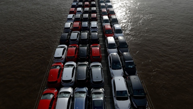 New Ford Fiesta automobiles, manufactured by Ford Motor Co., sit on a barge sailing to Vlissingen, Netherlands, on the River Rhine in Duesseldorf, Germany, on Wednesday, Feb. 13, 2019. The automaker said last month when announcing thousands of job cuts across Europe that it would merge its U.K. head office with a nearby technical center to cut costs, while warning that measures in the event of a no-deal Brexit would be significantly more dramatic. Photographer: Krisztian Bocsi/Bloomberg