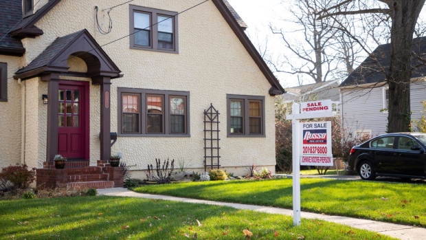 A pending home sale in Teaneck, New Jersey, US, on Thursday, Nov. 24, 2022. Real estate agents struggle to find listings as deals decline, mortgage rates remain high and signs point to leaner times ahead. Photographer: Yuvraj Khanna/Bloomberg