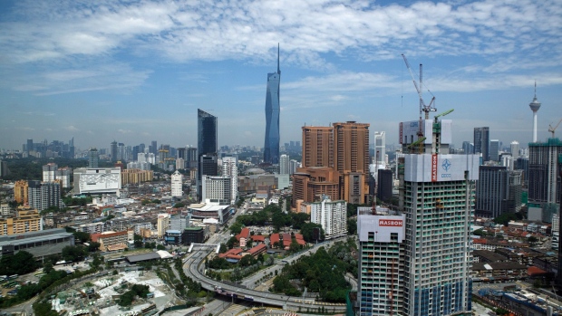 The Kuala Lumpur skyline seen from the Tun Razak Exchange (TRX) financial district in Kuala Lumpur, Malaysia, on Monday, Sept. 12, 2022. Malaysia’s Finance Minister Zafrul Aziz is confident the economy will expand faster than expected in the current year, supported by strong private consumption amid risks from a global slowdown. Photographer: Samsul Said/Bloomberg