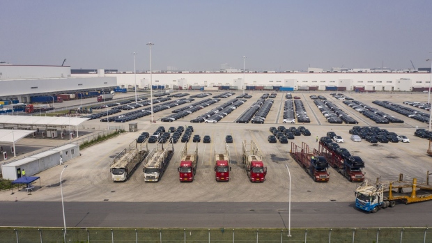 Vehicles in a lot at the Tesla Inc. Gigafactory in Shanghai, China, on Wednesday, June 15, 2022. Tesla has staged a remarkable comeback in terms of its production in China, with May output more than tripling despite the electric carmaker only recently getting its Shanghai factory back up to speed after the city’s punishing lockdowns.