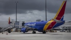 A passenger aircraft operated by Southwest Airlines Co. at Miami International Airport in Miami, Florida, U.S., on Wednesday, June 16, 2021. Daily U.S. air travelers exceeded 2 million for the first time since the coronavirus pandemic began, reaching almost three-quarters of the volume recorded on the same day in 2019, according to the Transportation Security Administration. Photographer: Eva Marie Uzcategui/Bloomberg