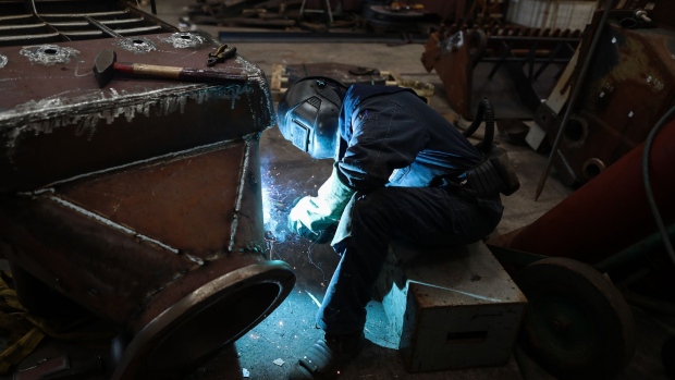 An employee welds steel boat parts at the Scheepsreparatie Gebr Matena BV ship repair yard in Papendrecht, Netherlands, on Monday, Feb. 20, 2017. Nothing cuts through Europe like the Rhine. Fought over for centuries, the river is at the core of postwar integration, the open market and the euro. Now the battle is over the future of that project in an historic year of elections starting this week in the Netherlands, France a month later and then Germany in September. Photographer: Simon Dawson/Bloomberg