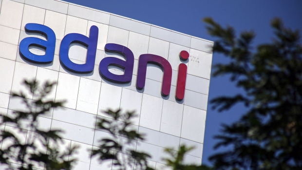 Signage atop the Adani Group headquarters in Ahmedabad, India, on Wednesday, Feb. 1, 2023. The crisis of confidence plaguing Gautam Adani is deepening, with the stock rout triggered by Hindenburg Research's fraud allegations erasing a third of the market value in his group’s companies despite the completion of a key share sale. Photographer: Dhiraj Singh/Bloomberg