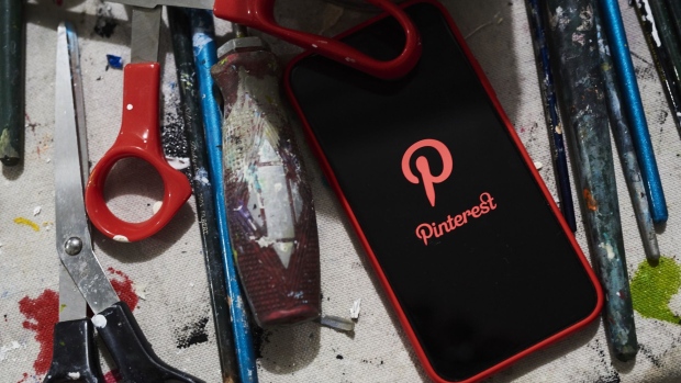 The Pinterest Inc. application is displayed on an Apple Inc. iPhone in this arranged photograph taken in Little Falls, New Jersey, U.S., on Saturday, Feb. 23, 2019. Pinterest has filed paperwork with the SEC for an initial public offering (IPO), the Wall Street Journal reports, citing unidentified people familiar with the matter.