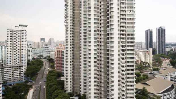 Blocks of condominium in Singapore, on Sunday, May 15, 2022. Singapore is scheduled to release its first-quarter gross domestic product (GDP) figures on May 19. Photographer: Ore Huiying/Bloomberg