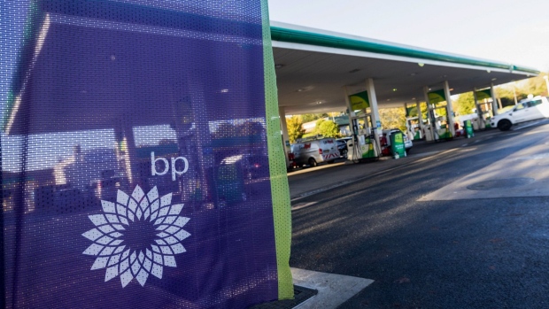 A sign at the entrance to a BP Plc petrol station forecourt in Chelmsford, UK, on Monday, Oct. 31, 2022. BP Plc posted its second-highest quarterly profit on record and announced a further $2.5 billion of share buybacks, capping a stellar period for Big Oil after Russia’s invasion of Ukraine pushed up energy prices. Photographer: Chris Ratcliffe/Bloomberg